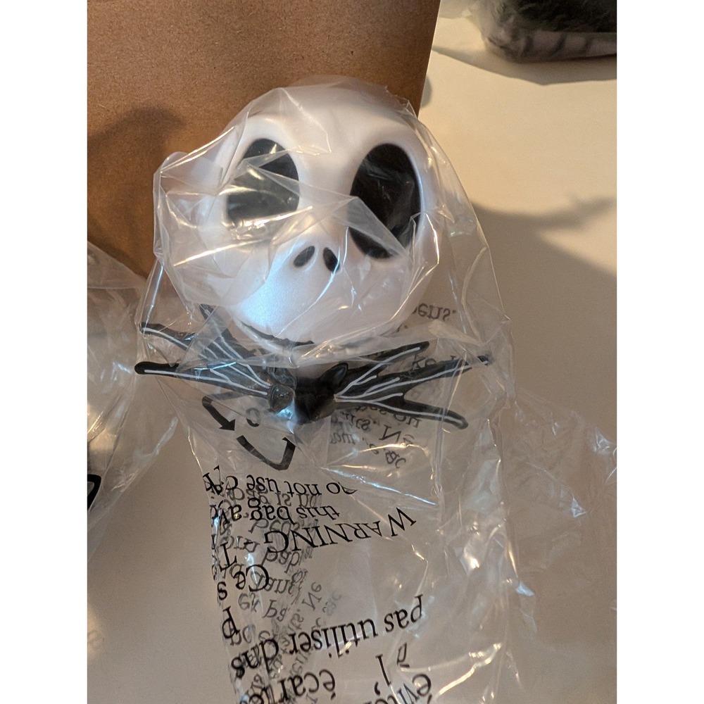 The NBC Jack Skellington Bath and BW wildflower plugin and coin purse